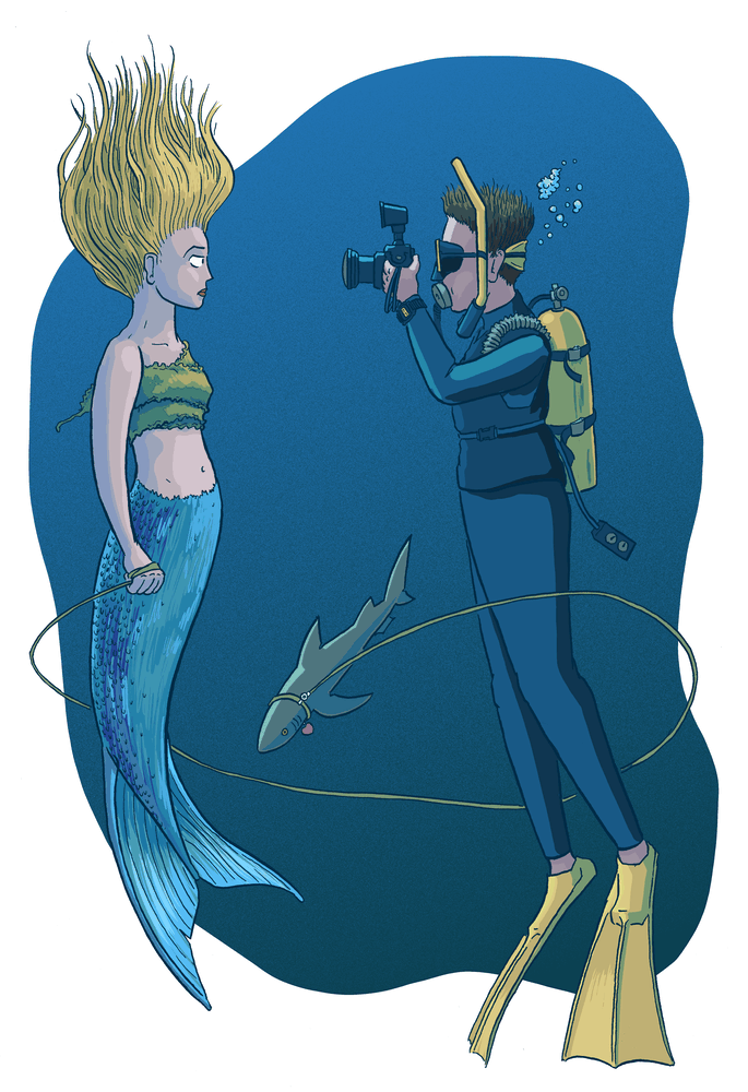 A mermaid with a pet shark, seen by a diver.